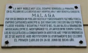 symbole et titre de Malaga : la muy noble, muy leal...