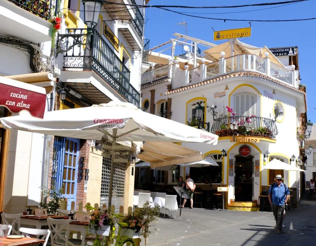 nerja places to see almirante ferrandiz street with restaurants and shops