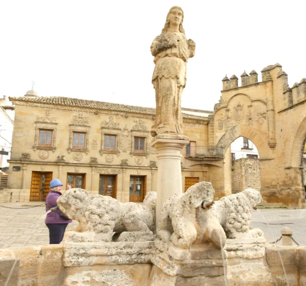 baeza best things to see populo square fountain jaen door